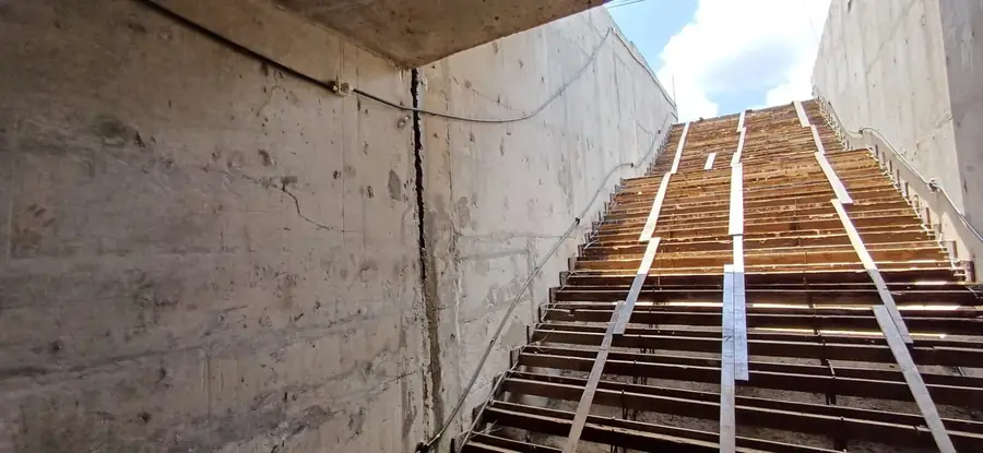 Cast staircase and off-form concrete wall