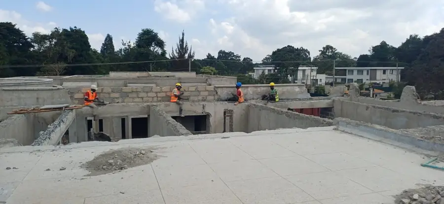 Roof slab with parapet walls