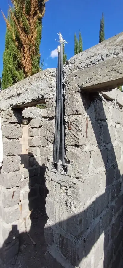Services chased into stone walling